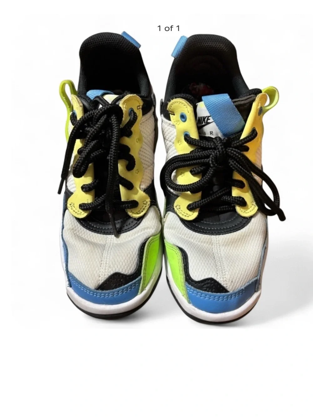 Nike Air Jordan’ size 6 Youth white, black, blue, yellow, pink.